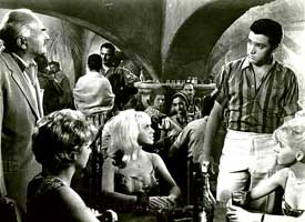 Fun in Acapulco (1963) met Elvis Presley.