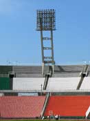 De karakteristieke lichtmasten van het Stadion.